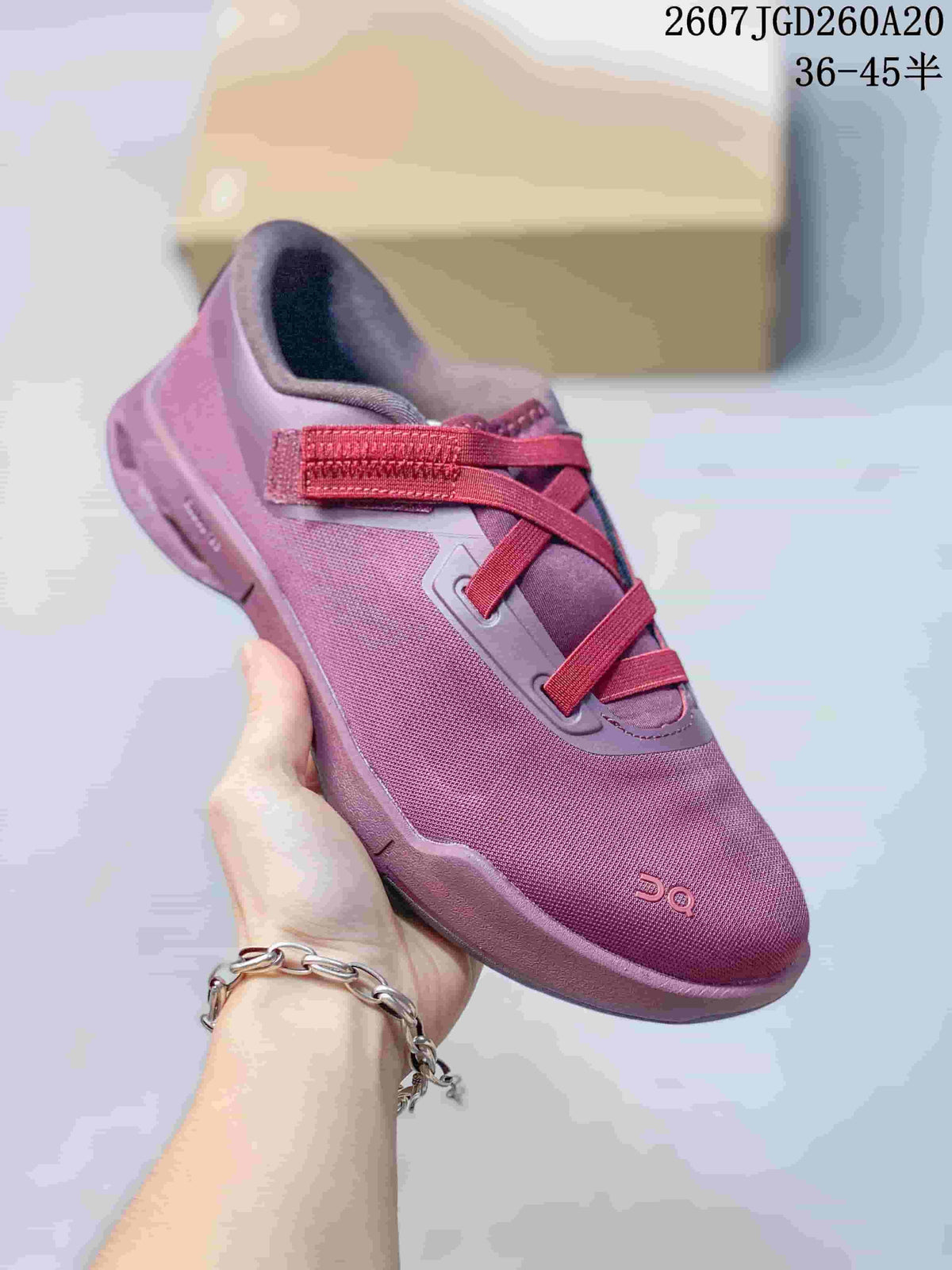 Close side view of a pink On Cloudnova Moon sneaker showing the layered fastening system and sculpted sole.