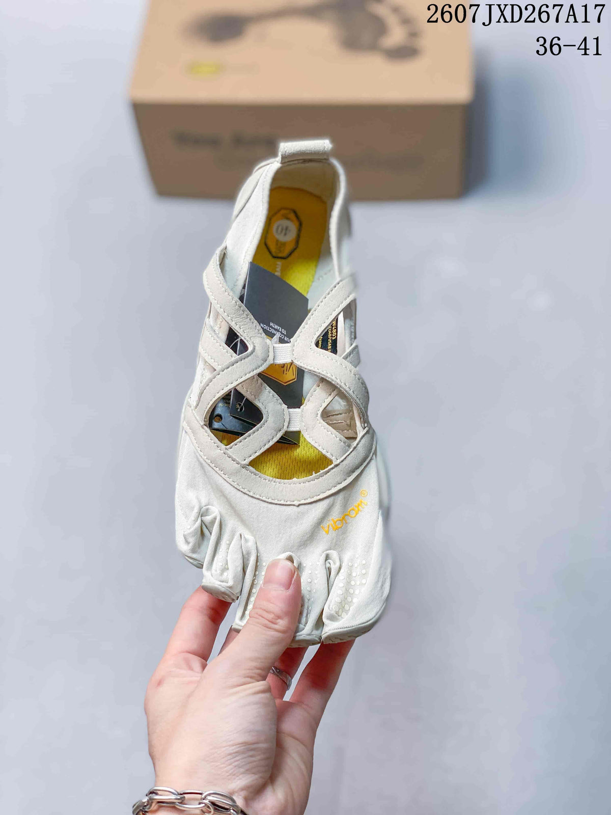 Top view of an off-white five-finger shoe showing the separate toe compartments, layered straps, and yellow footbed.