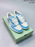 Pair of blue and white low-top Jordan sneakers displayed on a green shoe box, with Labubu text on the tongues and toe edges.
