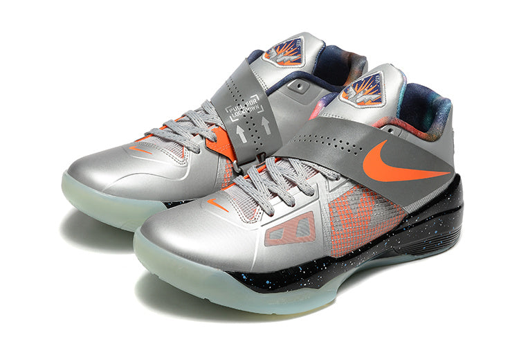 Pair of silver-gray Nike KD 4 shoes with orange details and pale translucent outsoles.