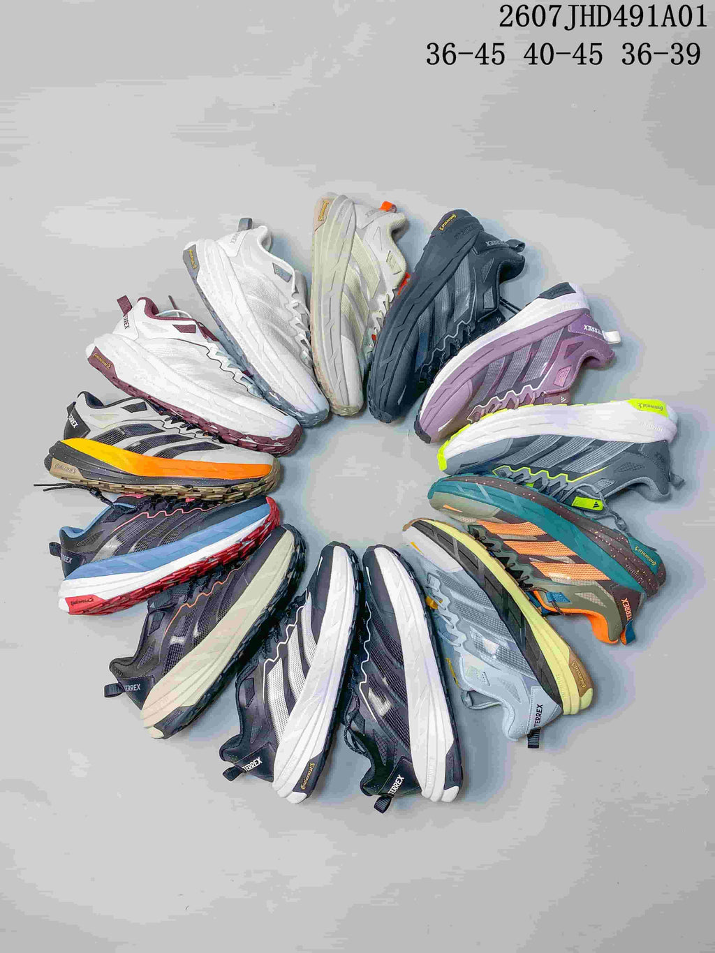 Several Adidas Terrex low-top shoes in assorted colors; image displays size ranges 36–45, 40–45, and 36–39.
