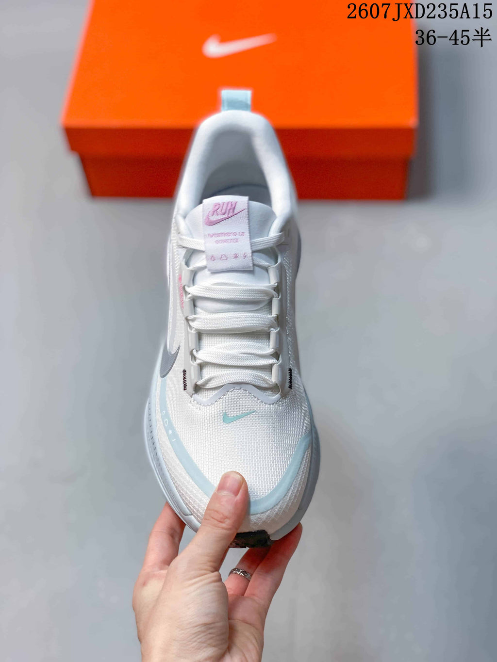 Top view showing the laces, tongue branding, and light-blue toe accents.