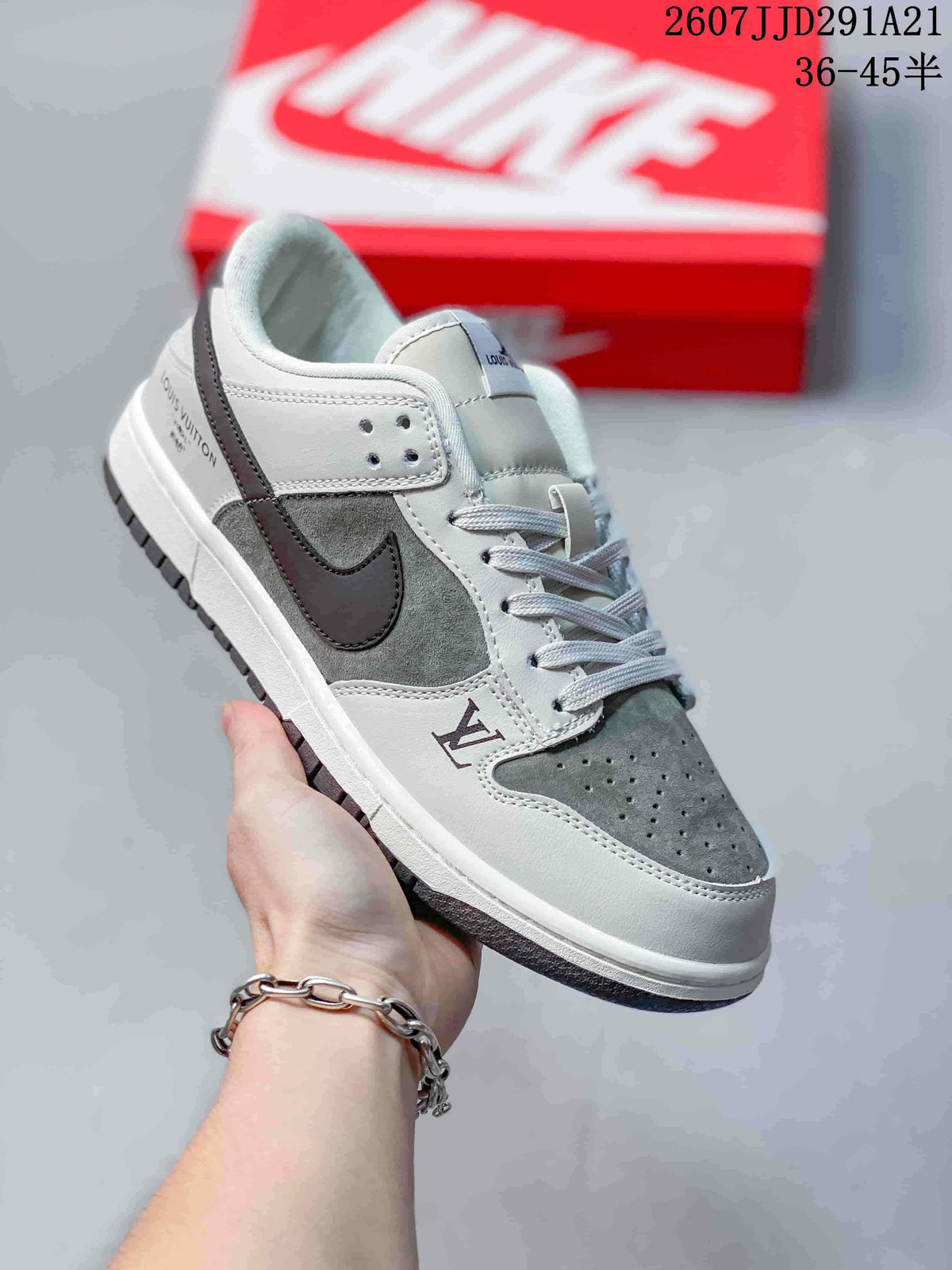 Angled side view showing the white and grey sneaker, dark side detailing, perforated toe, and visible Louis Vuitton branding.