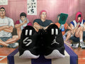 Rear view of black Jordan basketball shoes with white heel details and Jumpman embroidery