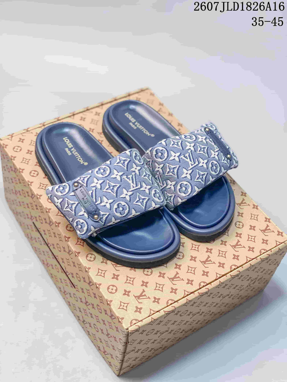 Blue Louis Vuitton Pool Pillow monogram slides displayed on a patterned box; style code and size range are visible at the top.