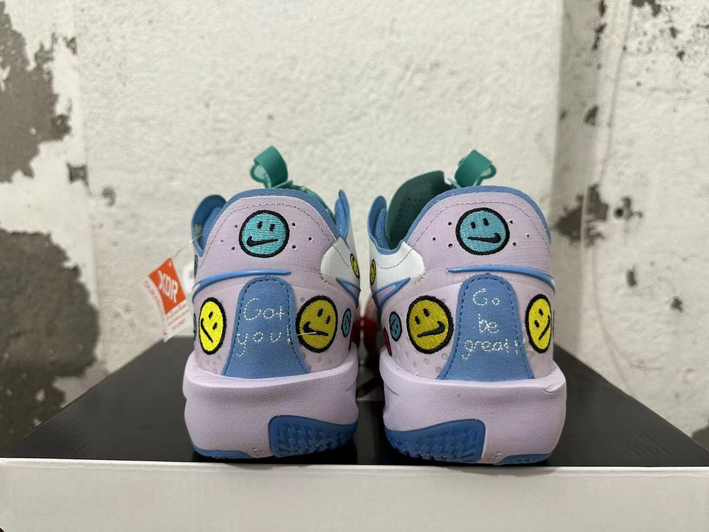 Rear view of multicolor Nike basketball shoes with embroidered smiley faces and lilac heels.