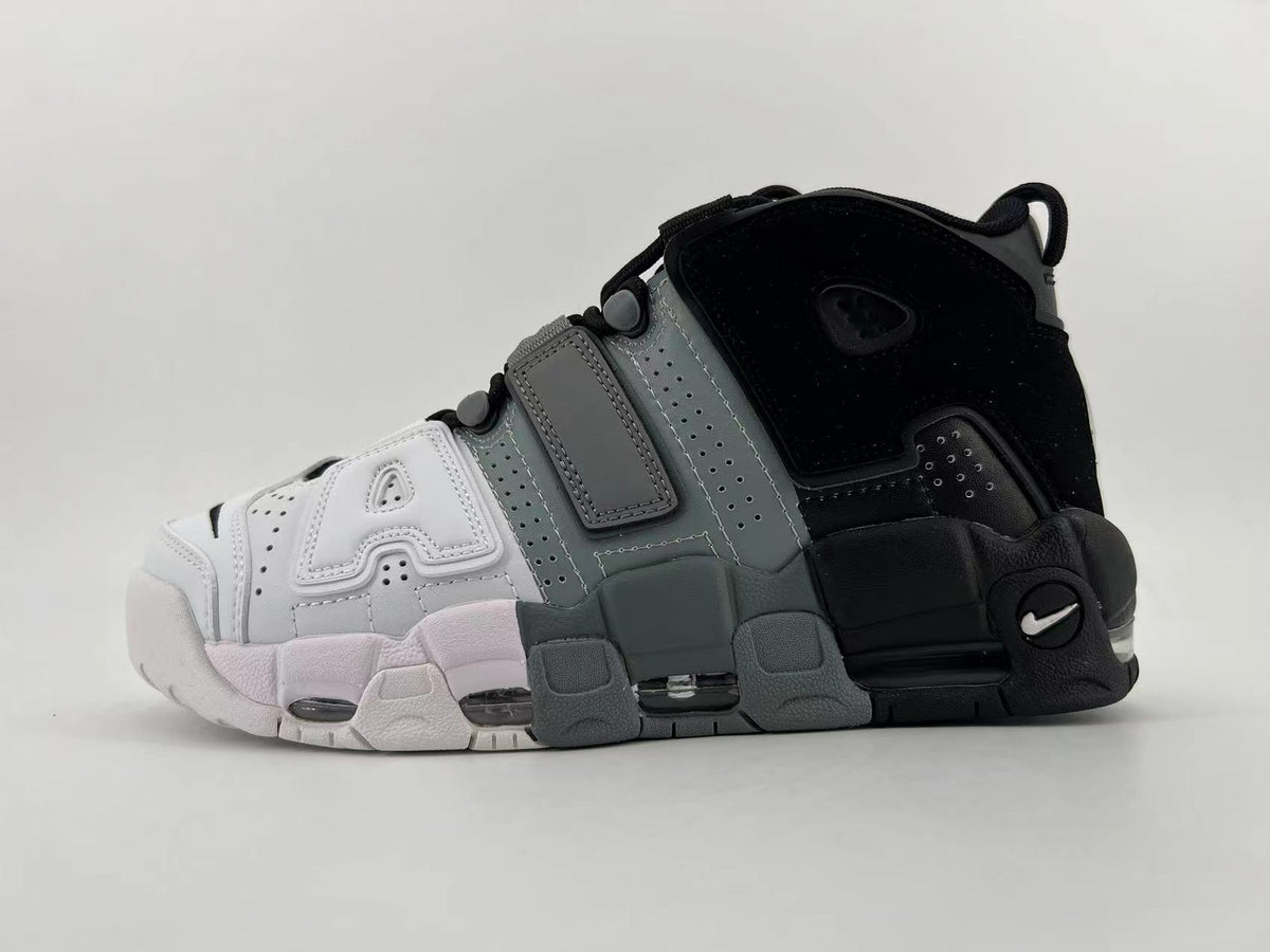 Side view of a black, grey, and white Nike Air More Uptempo high-top sneaker