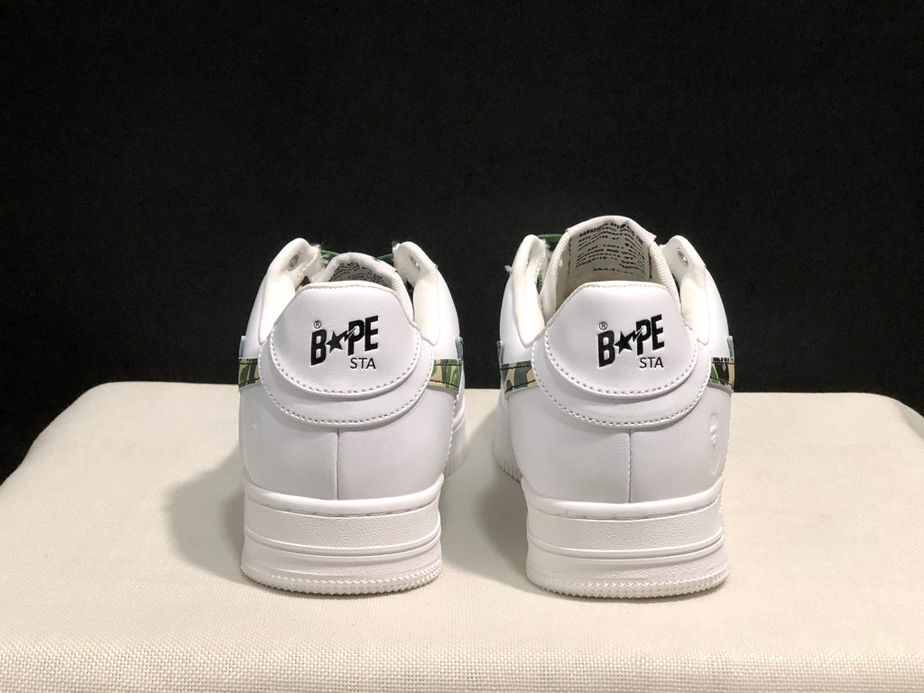 Rear view of the pair showing BAPE STA branding on the white heel tabs.