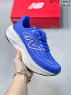 Blue New Balance running sneaker with matching blue upper and branding, paired with a white midsole.