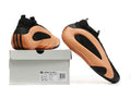 Black and peach-orange Adidas Harden Vol. 8 shoes shown with shoe box and outsole view
