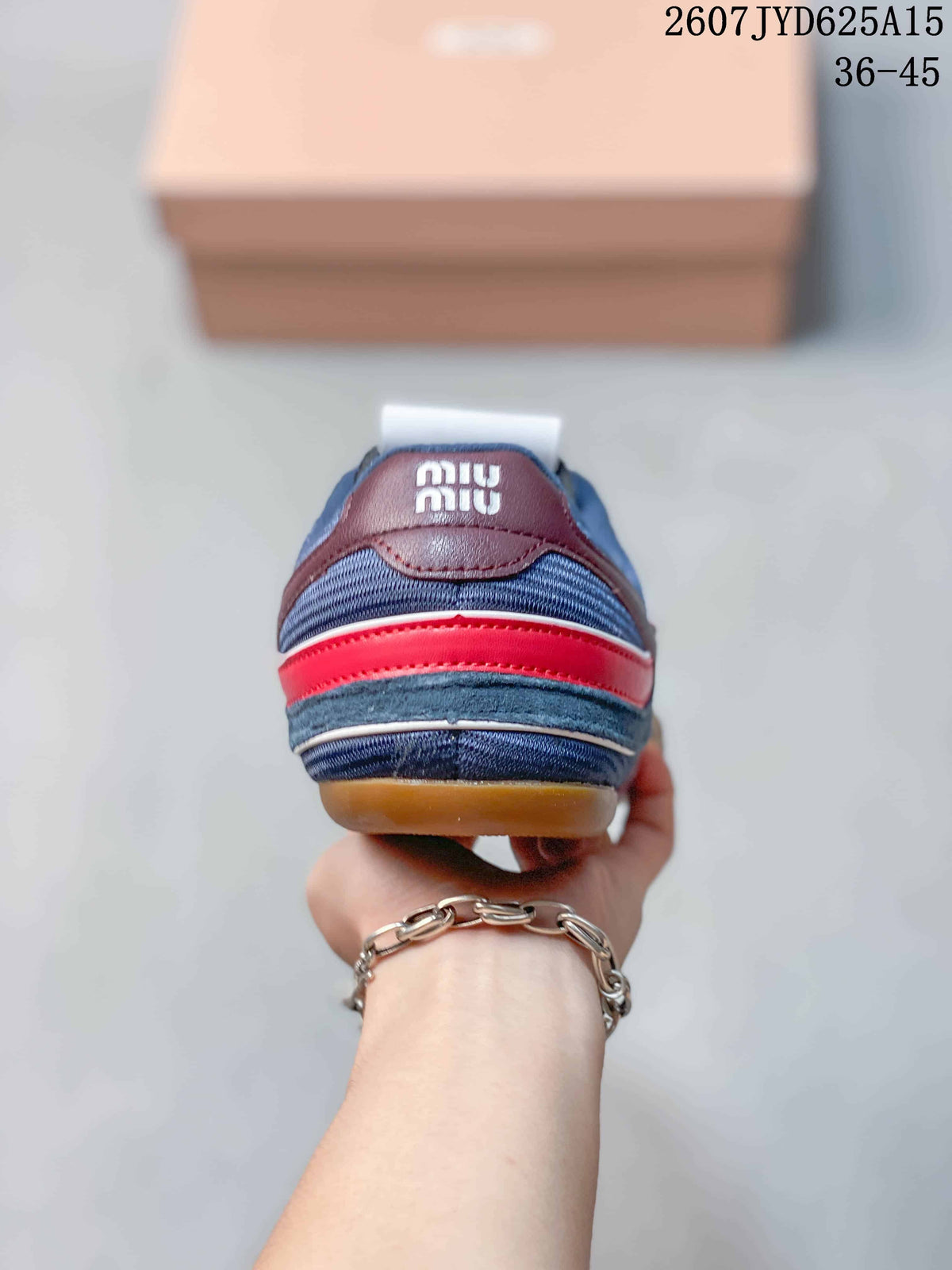 Rear view of the navy sneakers showing the red heel accent, burgundy heel panel, and Miu Miu branding; image text lists sizes 36–45.