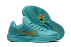 Aqua basketball shoes shown beside a view of the patterned outsole.