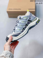 Side profile of the Salomon XA Pro 3D sneaker showing mesh panels, cord fastening, layered overlays, and lugged outsole.