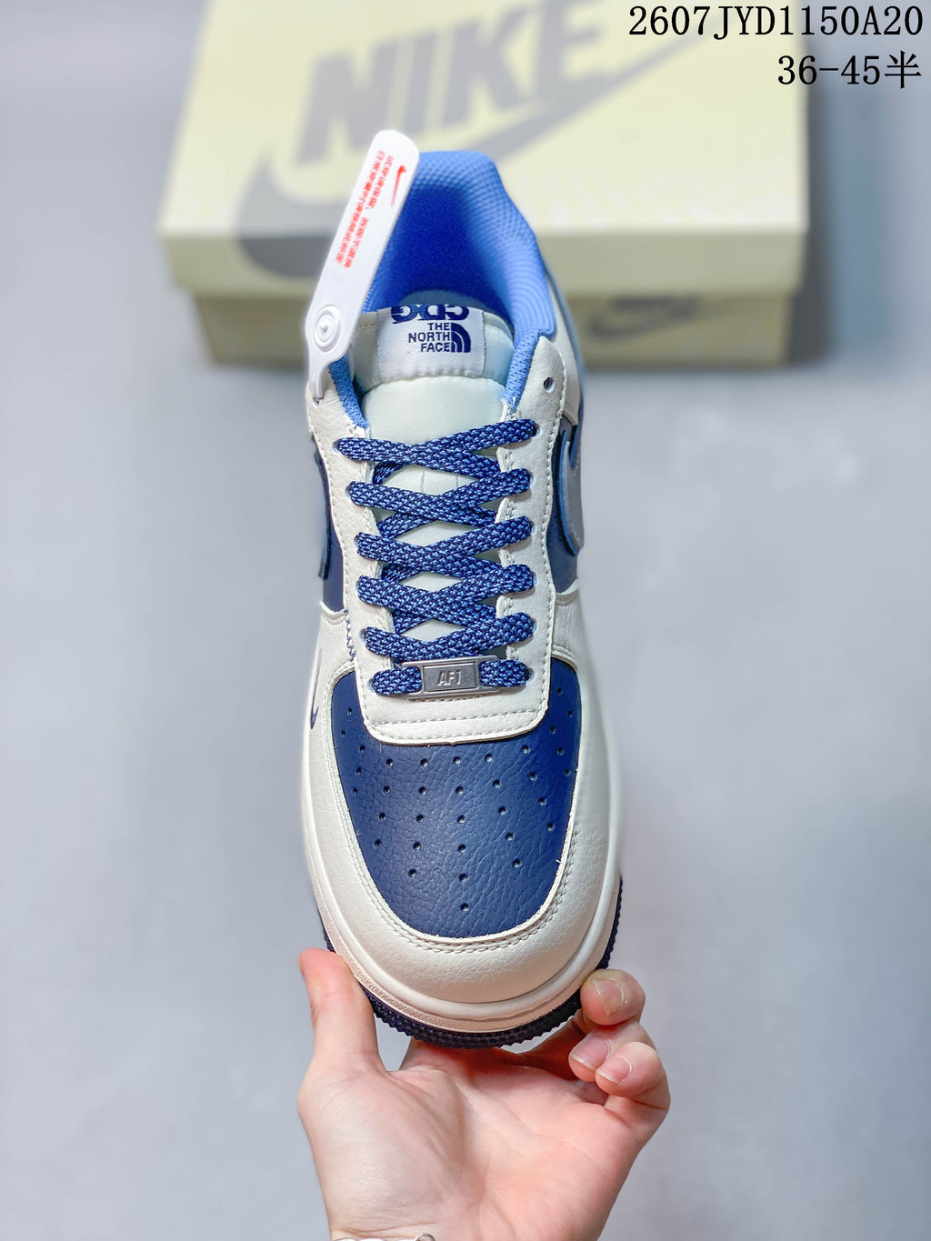 Top view showing the perforated blue toe box, white overlays, and blue laces.