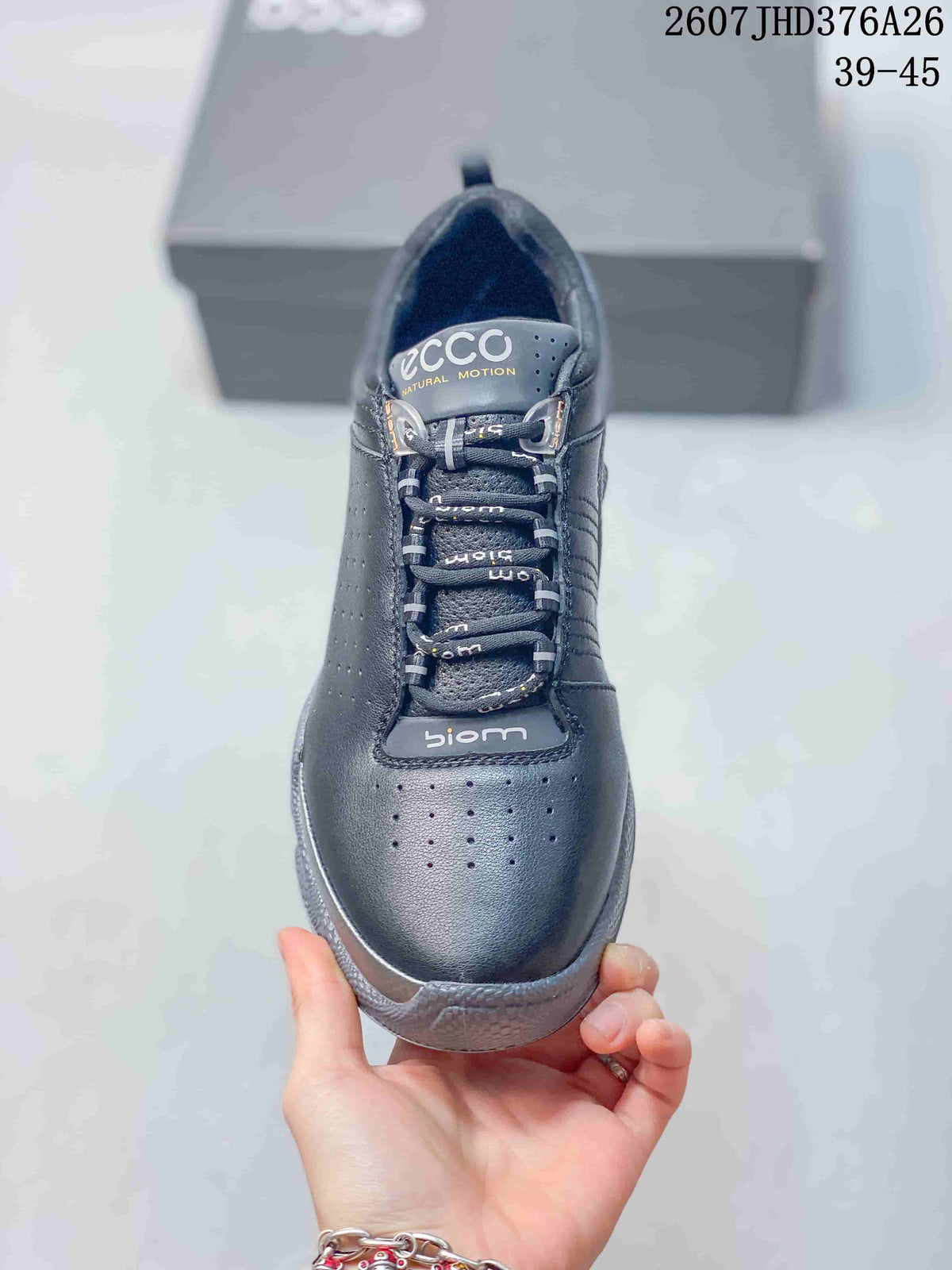 Top view of the black ECCO BIOM sneaker showing the perforated toe, laces, and branded tongue.
