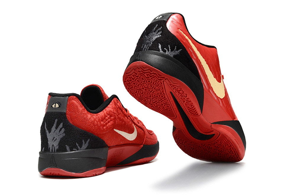 Red, black, and gold Ja 2 shoes shown from the heel and outsole.