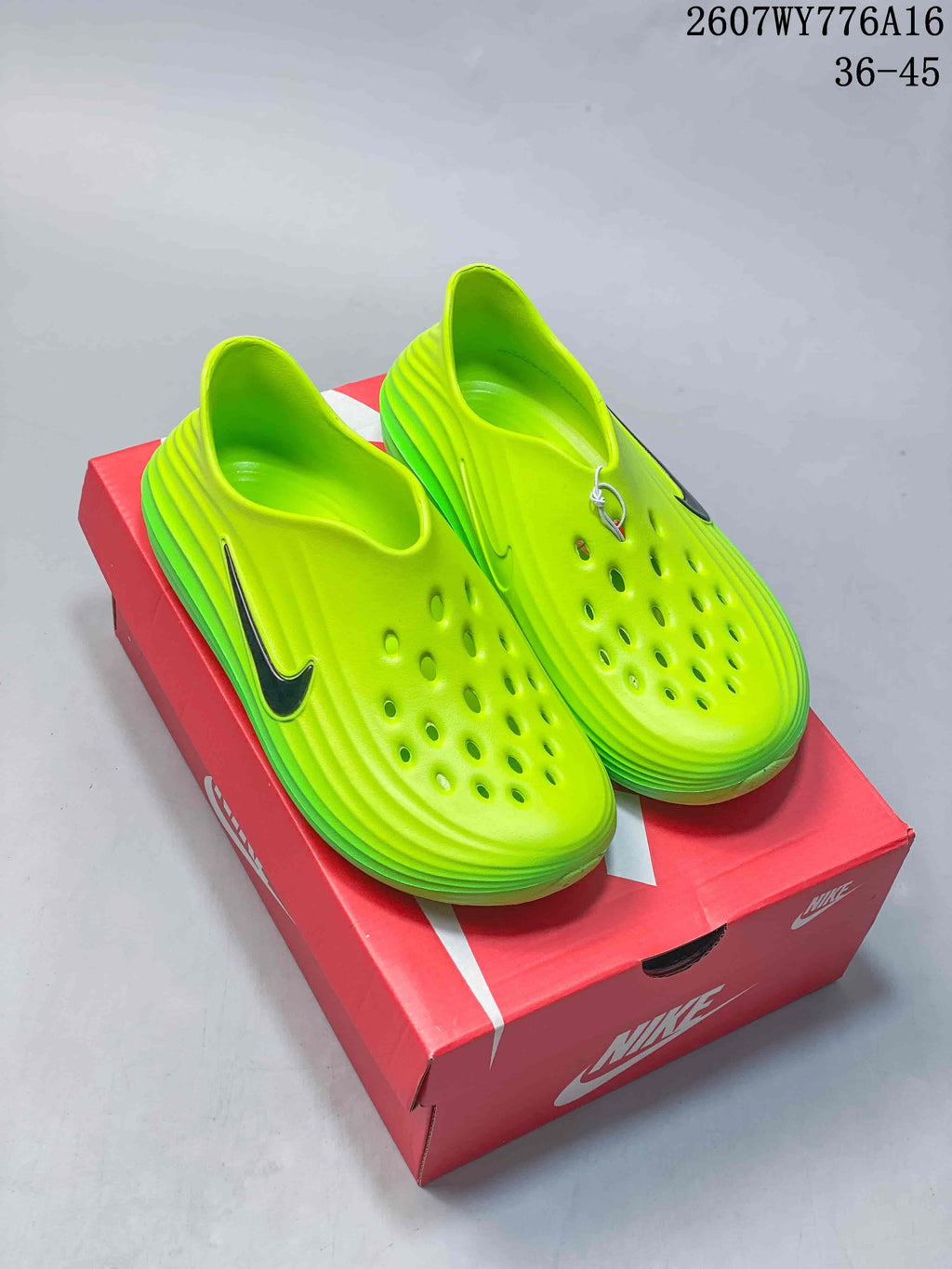 Pair of neon green Nike clogs displayed on a red shoebox; the image shows style code 2607WY776A16 and size range 36–45.