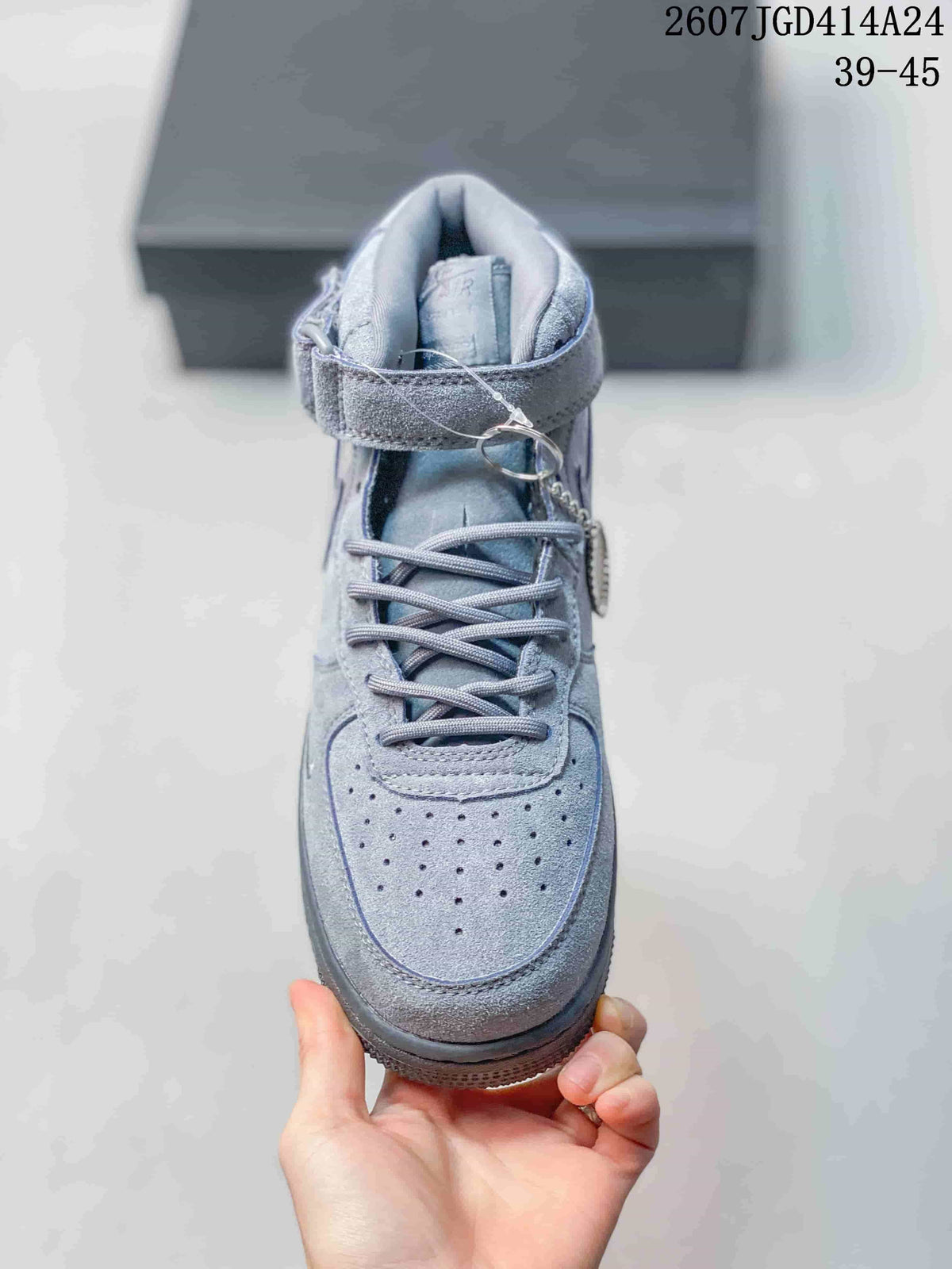 Top view of the gray sneaker showing the perforated toe box, laces, padded tongue, and ankle strap.