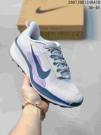 Light gray and lavender Nike ReactX Pegasus ACG Trail 6 sneaker with a blue outsole.