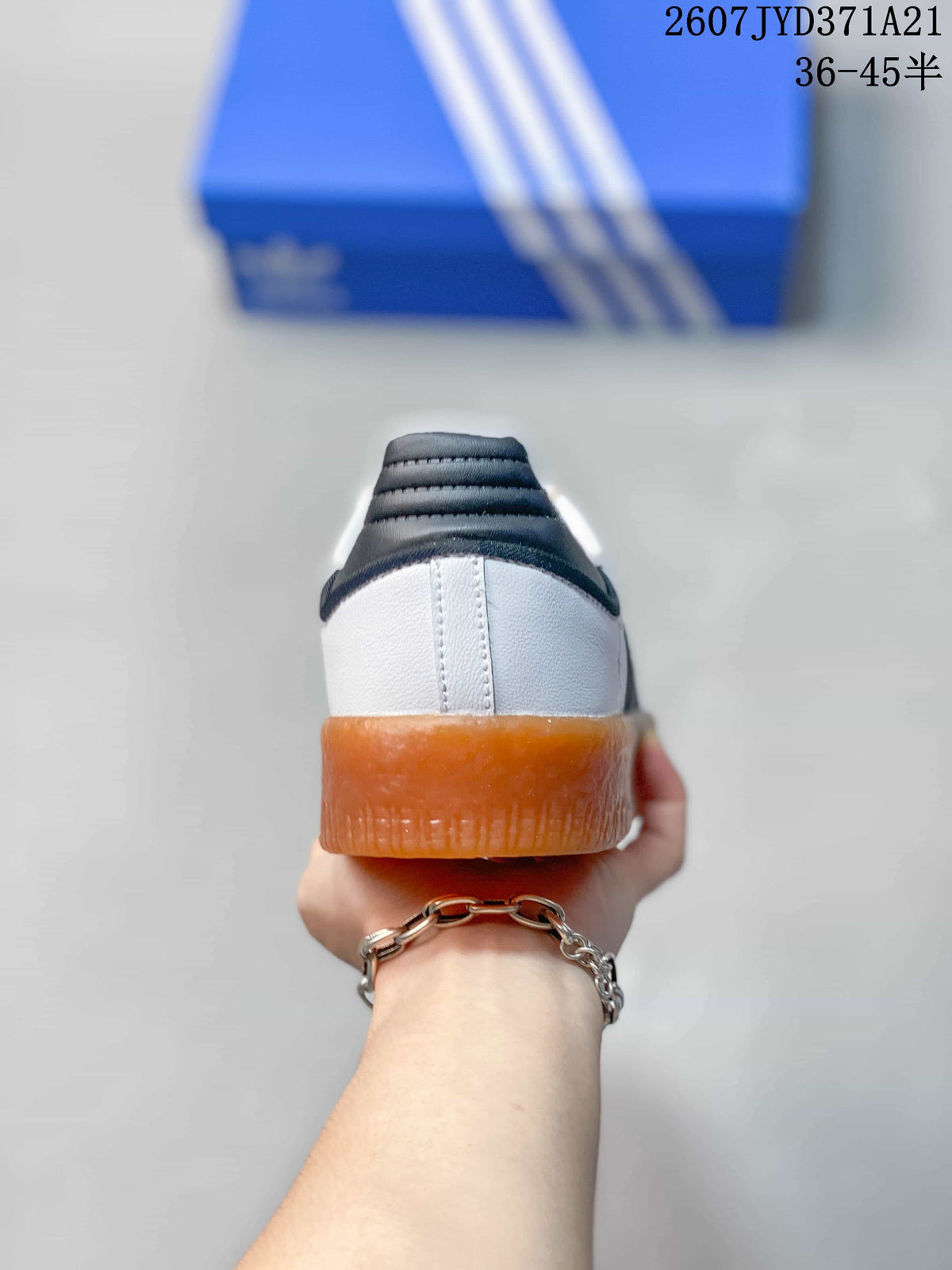 Rear view showing the white heel, black heel padding, and gum-colored outsole.