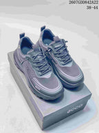 Pair of dark gray ECCO sneakers displayed on a branded shoe box, showing the mesh-textured upper, lace system, side accents, and style code 2607GDD842A22.