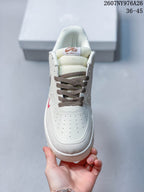 Top view showing the perforated toe box, padded tongue, and brown laces.