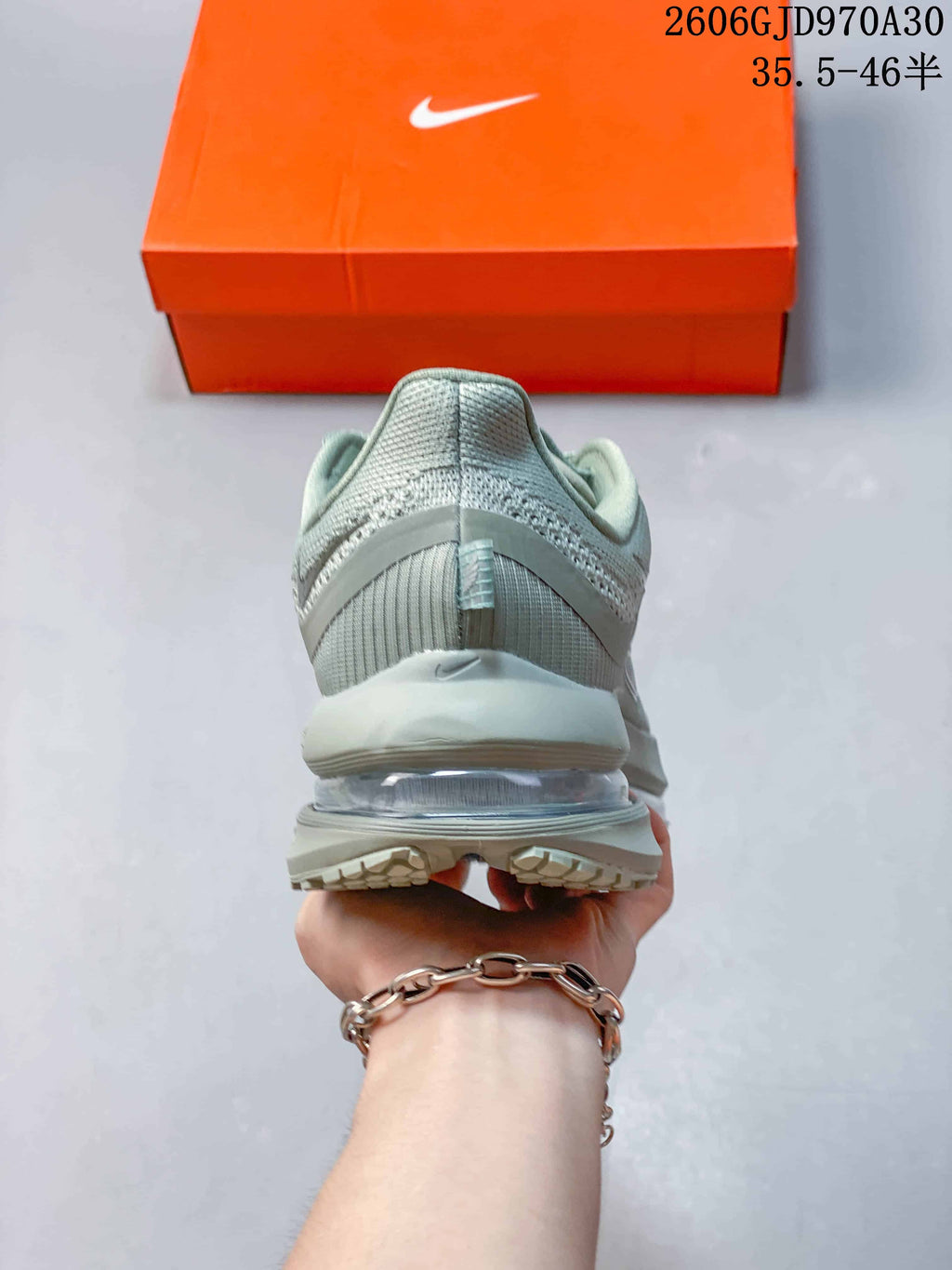 Rear view showing the heel and visible midsole element of the shoe
