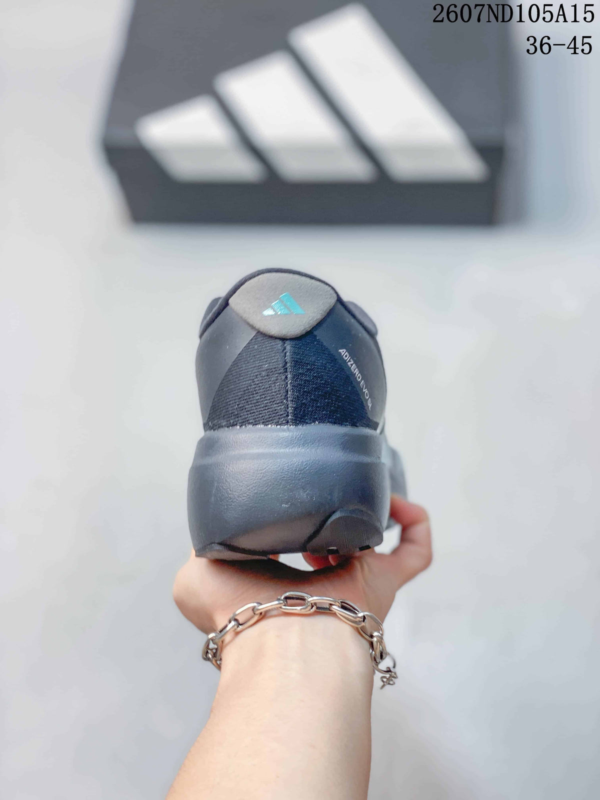 Rear view of the sneaker showing the padded heel collar, heel branding and thick dark outsole.