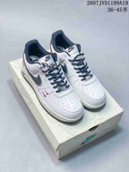 Pair of white and black Nike Air Force 1 low sneakers displayed on a branded shoe box; image text shows style code 2607JVD1199A19 and size range 36–45.