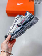 Side profile showing the layered upper, pink Swoosh accent, and thick textured sole.