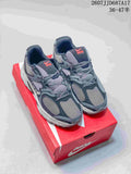 Pair of gray Nike V5 RNR sneakers displayed on a red shoebox, with the style code and size range visible at the top right.