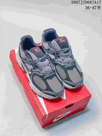 Pair of gray Nike V5 RNR sneakers displayed on a red shoebox, with the style code and size range visible at the top right.