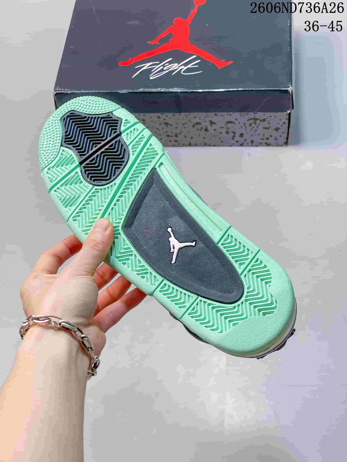 Outsole view showing the mint green tread, dark traction sections, and Jumpman mark.