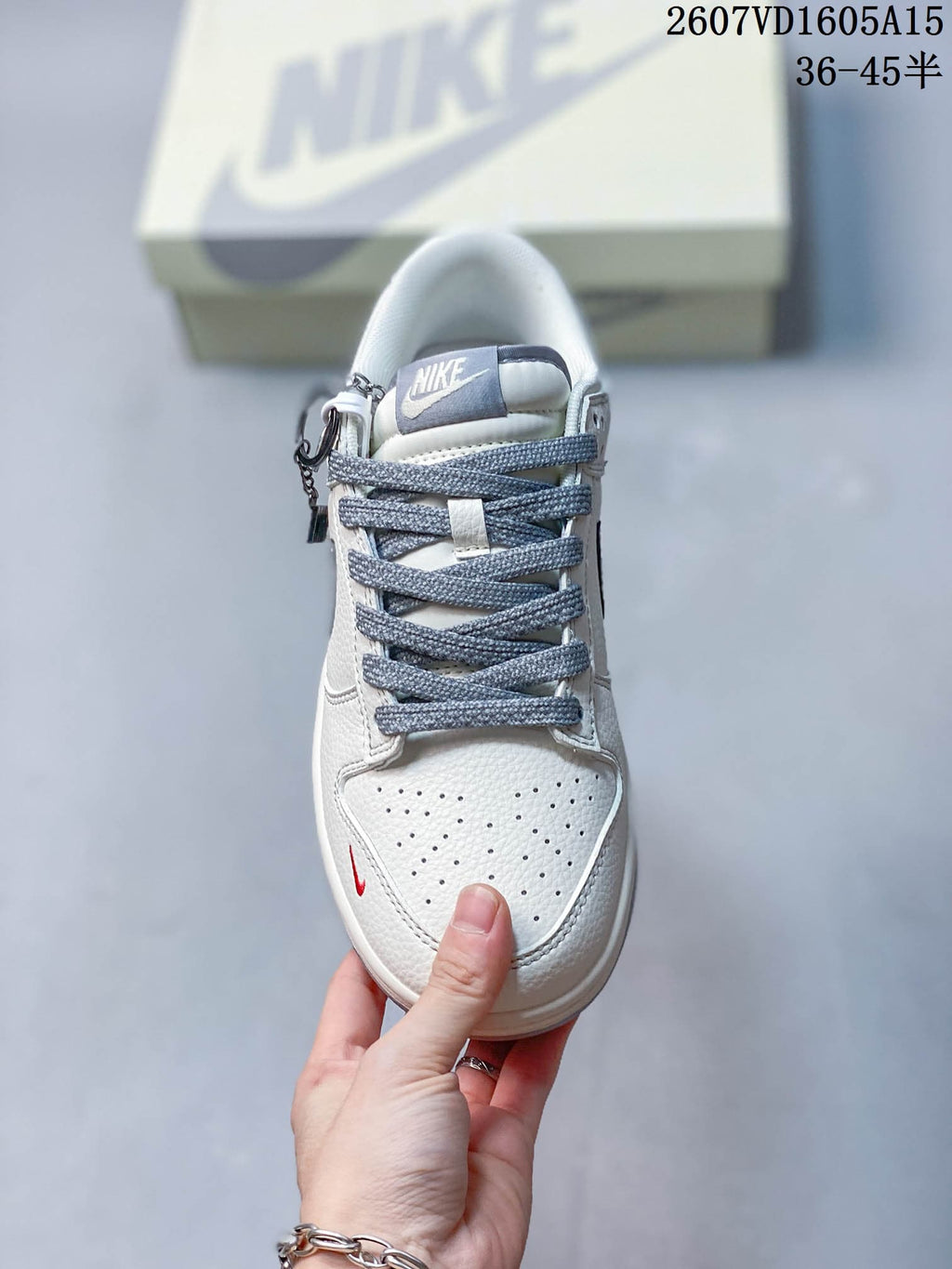 Top view showing the perforated toe box, gray laces, and Nike tongue label.