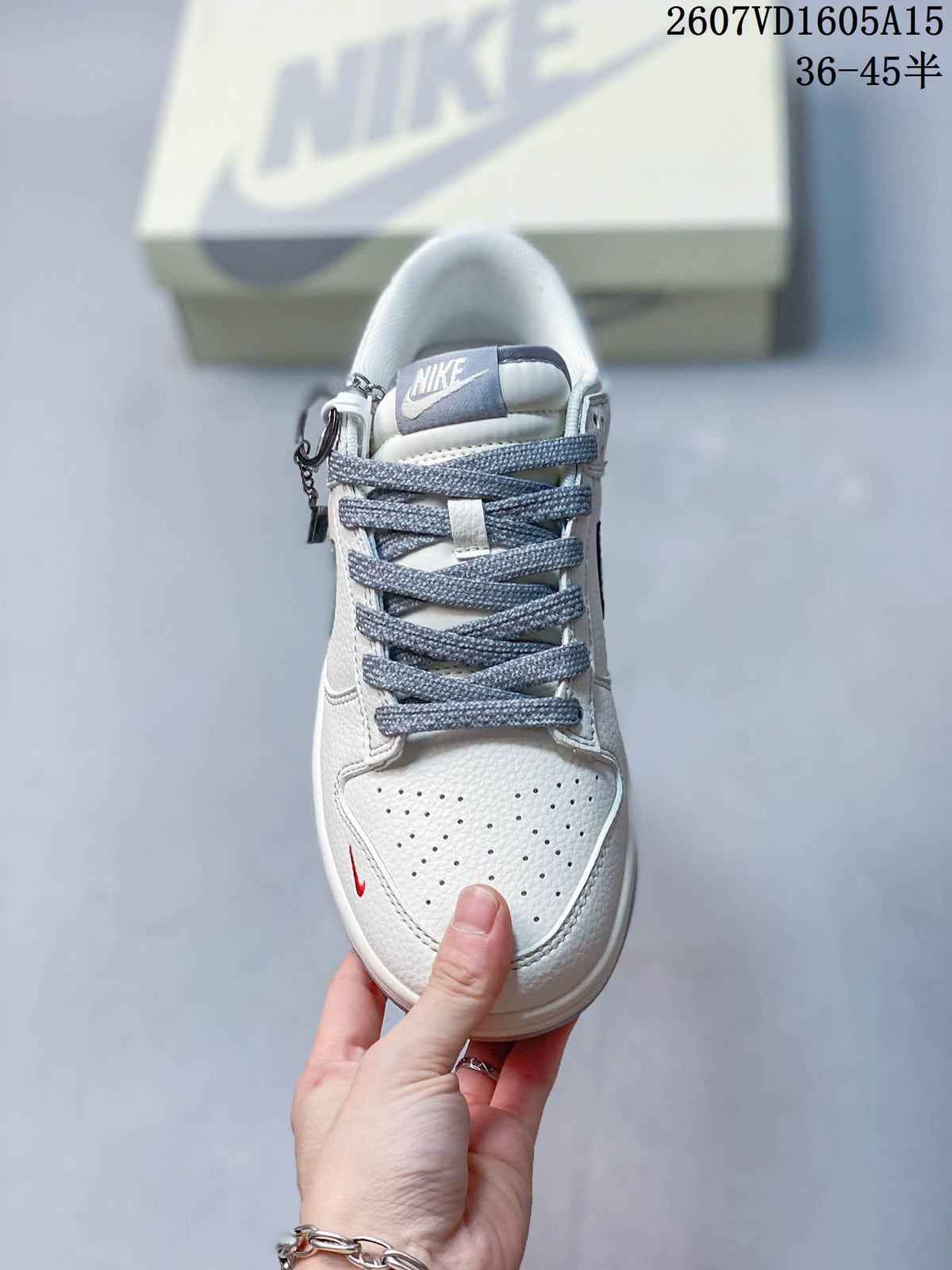 Top view showing the perforated toe box, gray laces, and Nike tongue label.