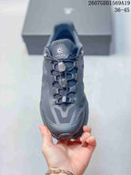 Front view of the KAILAS shoe showing the mesh upper, cord-lock lacing system, padded tongue, and protective toe area.