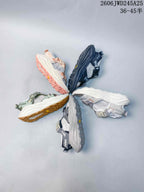 Several HOKA Infini Hike TC sandals shown from different angles and in multiple colorways