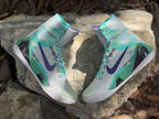 Overhead view of both patterned high-top shoes