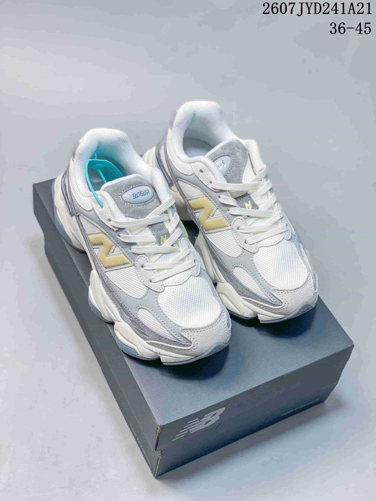 Pair of white, grey, yellow and blue New Balance 9060 sneakers shown on a shoe box; image text shows style code 2607JYD241A21 and size range 36–45.