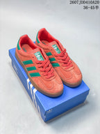 Pair of coral and green adidas sneakers displayed on a blue shoebox; overlay text shows style code 2607JDD410A20 and size range 36–45.