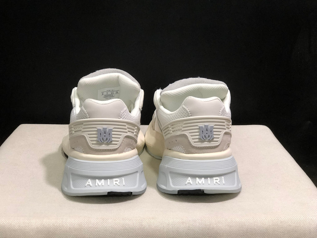 Rear view showing AMIRI branding on the heels and the padded heel structure.