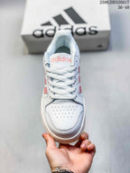Top view of the adidas Entrap sneaker showing the perforated toe, white laces, and padded tongue.