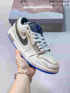 Angled view of the sneaker showing its dark textured side overlay and blue outsole.