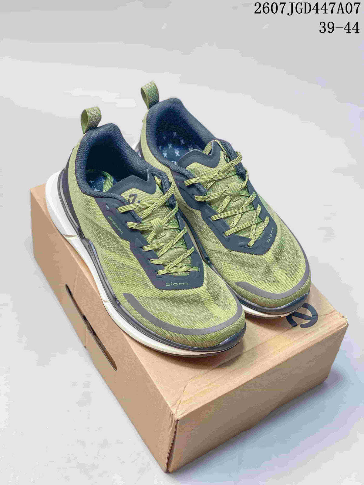Green and navy ECCO sneakers displayed on a shoe box, with the style code and size range visible at the top right.