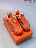 Pair of orange Nike Air Pegasus Premium sneakers displayed on an orange shoebox.