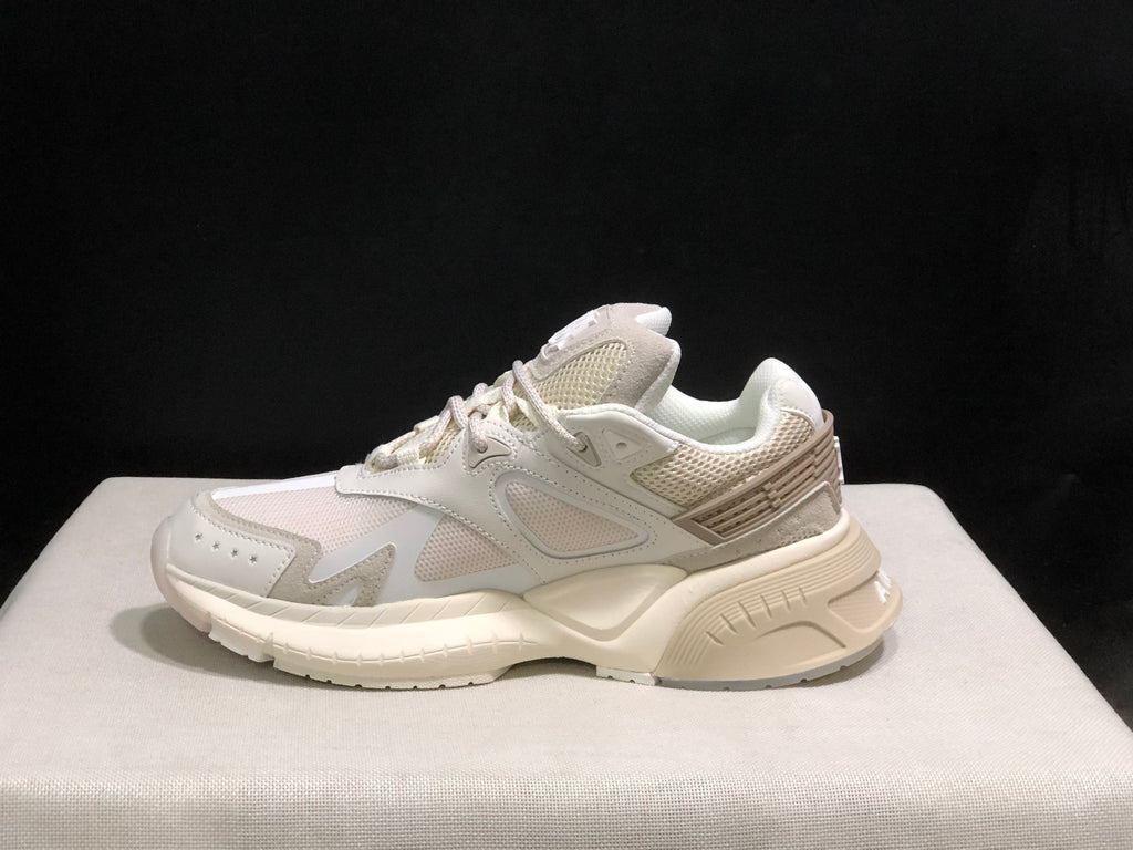 Single side profile of an AMIRI MA Runner sneaker showing the layered upper and sculpted midsole.