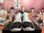 Front view of black and white Nike basketball shoes with white laces.