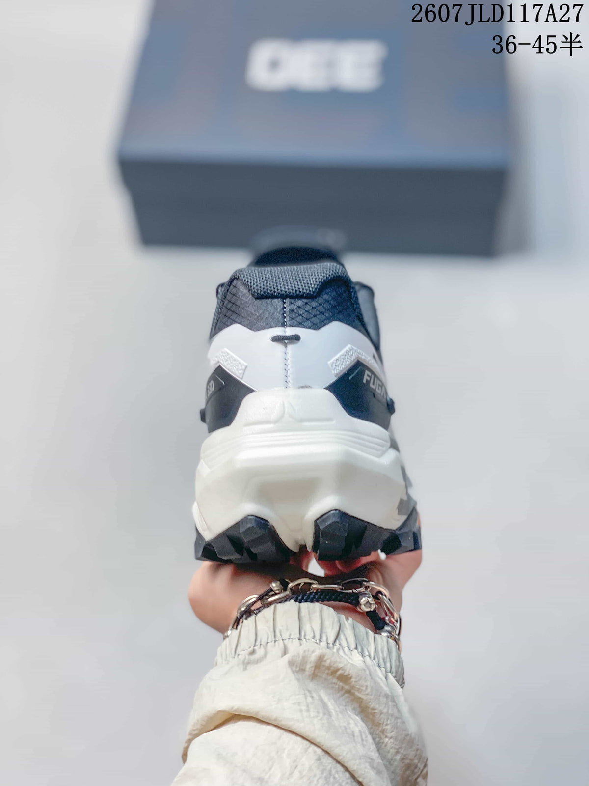 Rear view of the trail running shoe showing the raised heel structure, heel branding and lugged outsole; overlay text shows sizes 36–45.