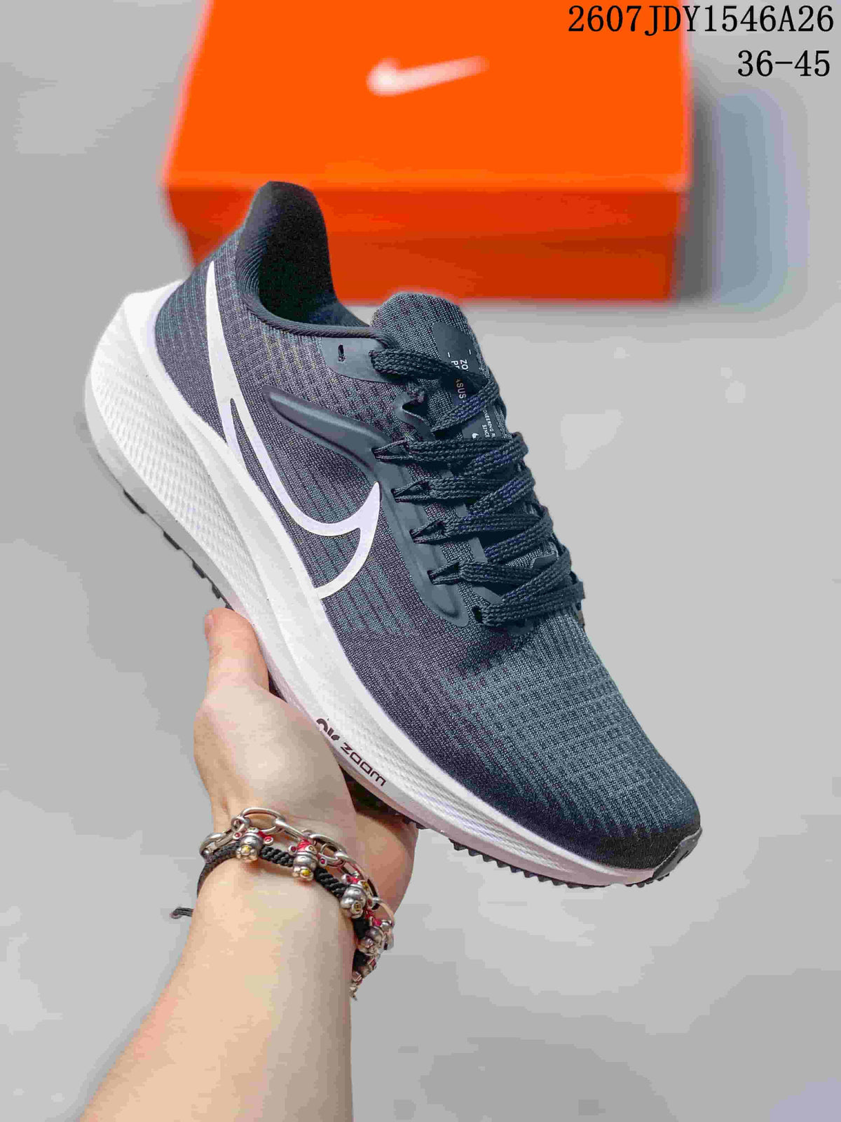 Dark gray Nike Air Zoom Pegasus 39 sneaker with white side branding and a white midsole.