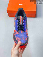 Top view showing the patterned upper, black laces, and tongue detail